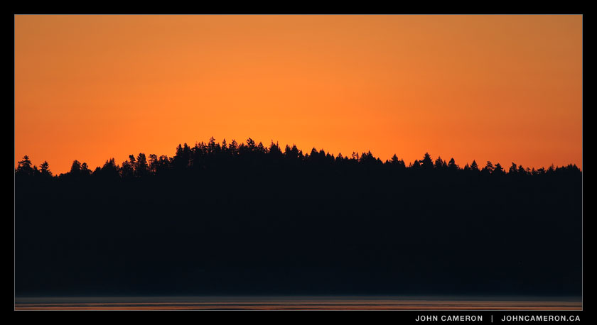 An orange sunrise photo from salt spring island